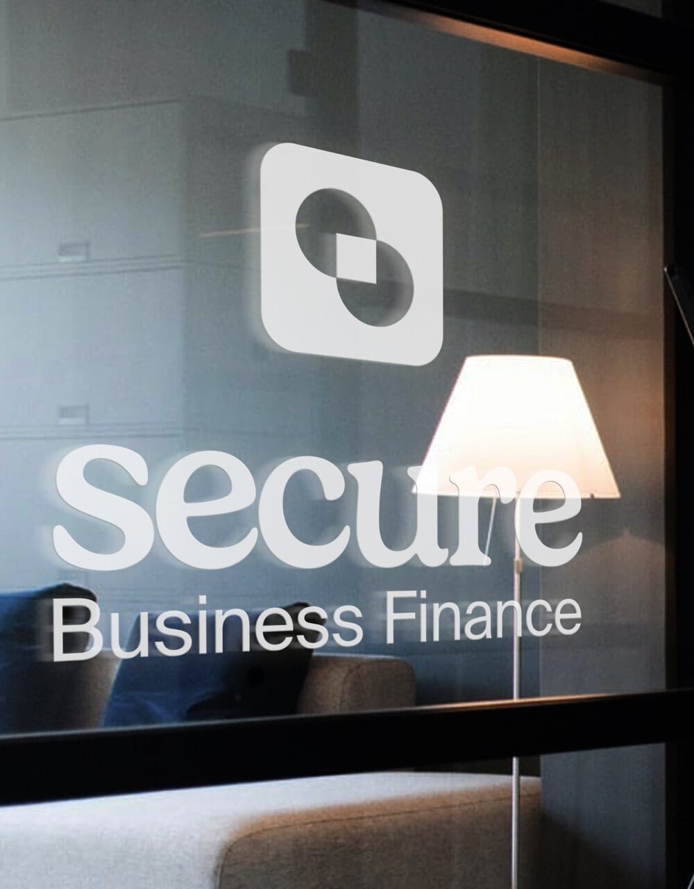 The Secure Business Finance mark on the office glazing
